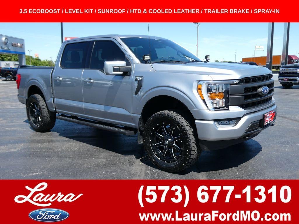 2023 Ford F-150 LARIAT 4WD SuperCrew 5.5' Box in Iconic Silver Metallic — front three-quarter view