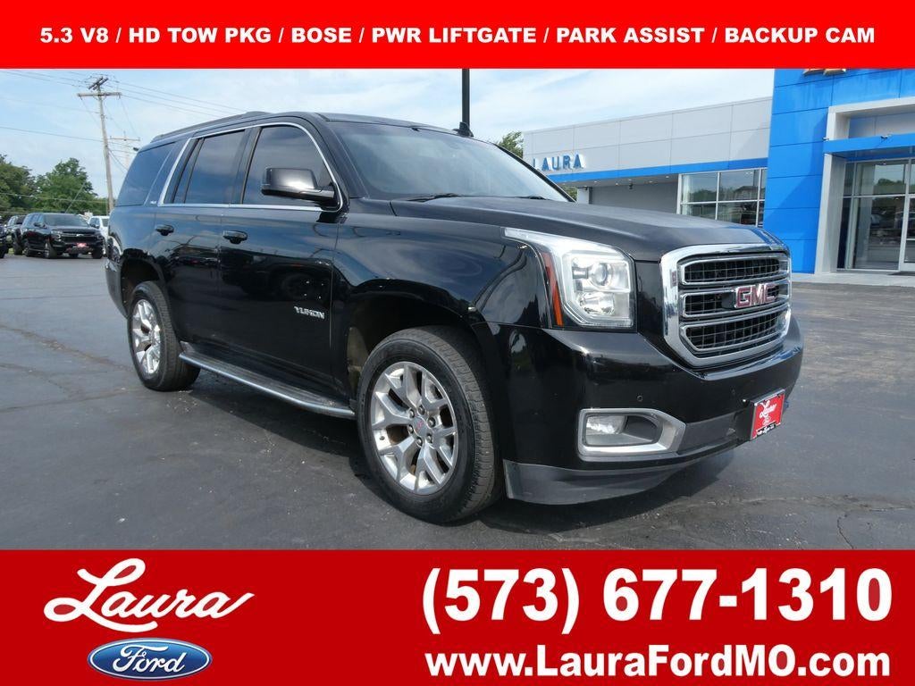 2017 GMC Yukon 4WD 4dr SLE in Onyx Black — front three-quarter view