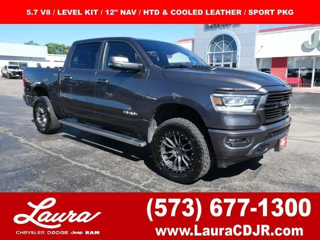 2023 RAM 1500 Laramie Crew Cab 4x4 5'7' Box in Granite Crystal Metallic Clearcoat — front three-quarter view