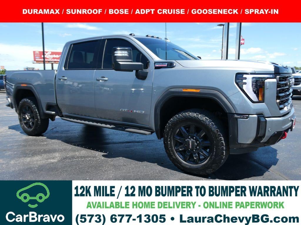 2024 GMC Sierra 2500 HD AT4 in Sterling Metallic — front three-quarter view