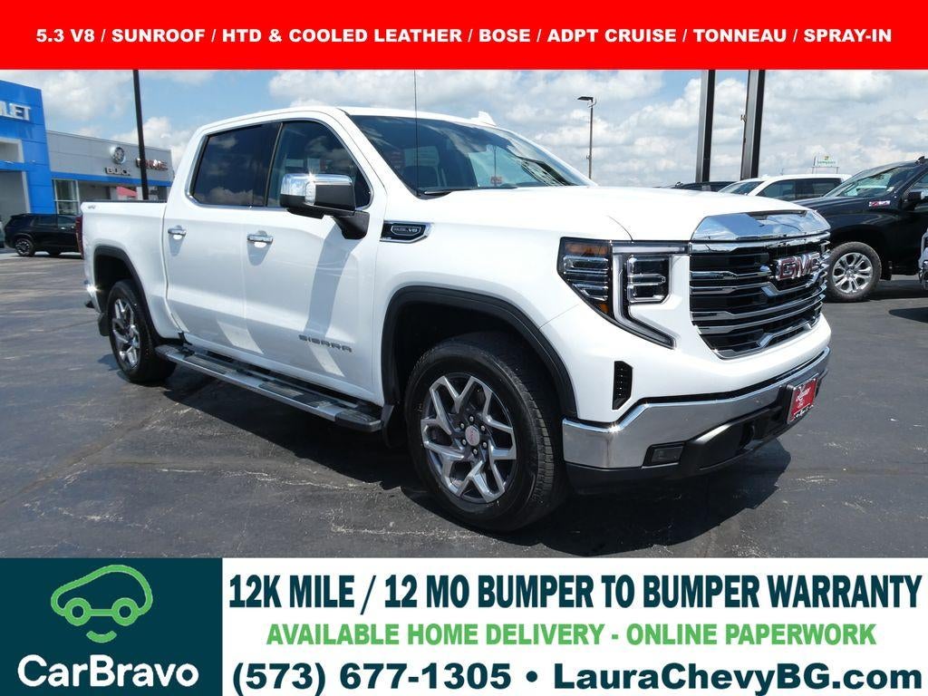 2026 GMC Sierra 1500 SLT in Summit White — front three-quarter view