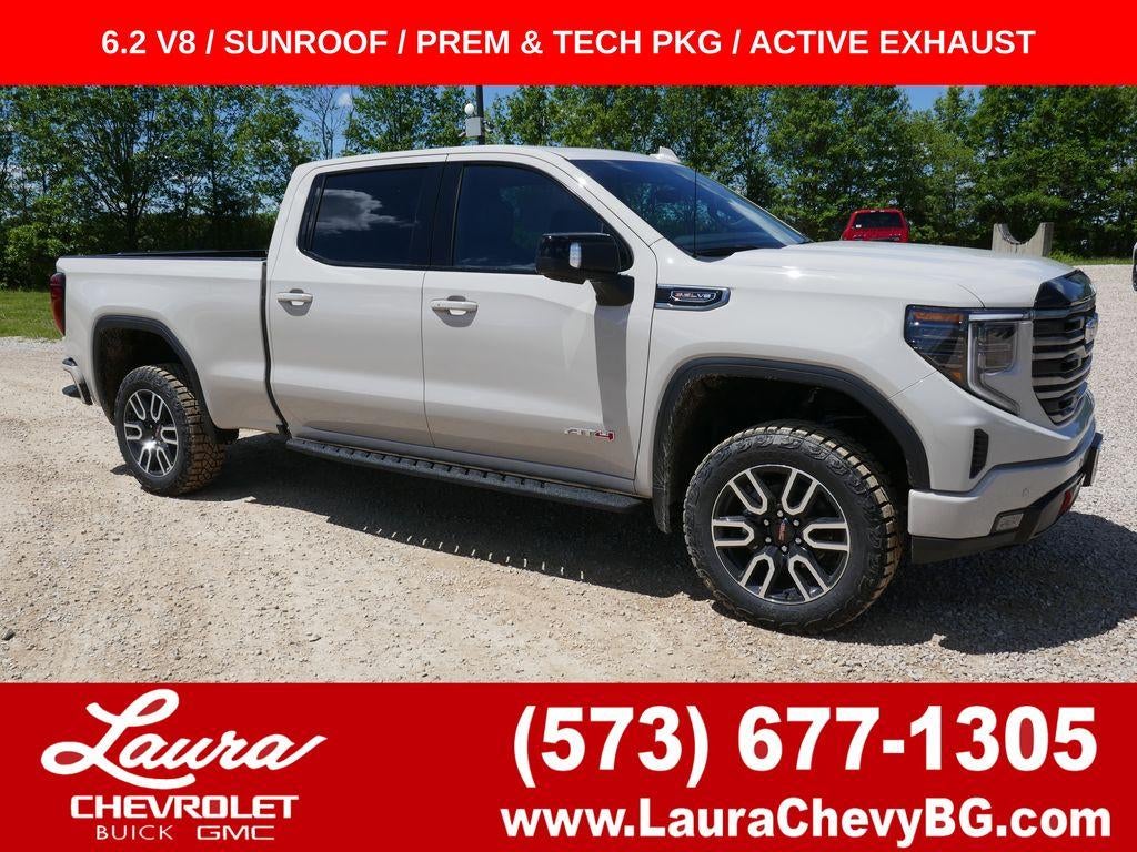 2026 GMC Sierra 1500 AT4 in Coastal Dune — front three-quarter view