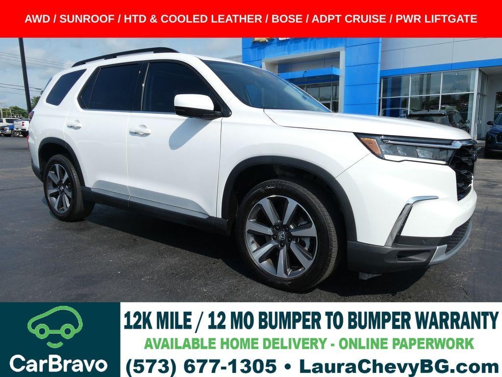 2024 Honda Pilot Elite in White — front three-quarter view